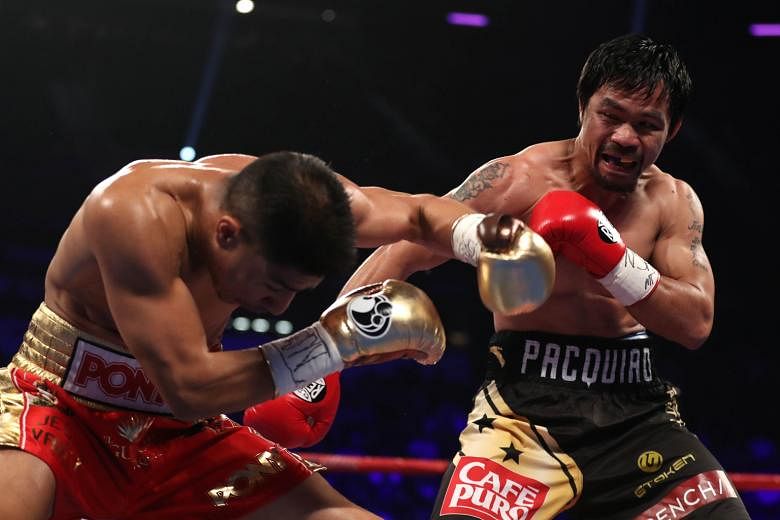 American Jessie Vargas reeling against Manny Pacquiao during the latter's victory in their WBO welterweight championship fight in Las Vegas on Saturday.