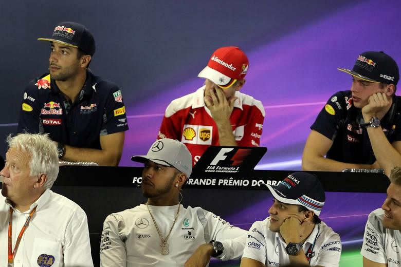 F1 race director Charlie Whiting (bottom left) leading the drivers' media conference at the Brazilian Grand Prix. Sebastian Vettel (in red) and his Ferrari team have yet to record a win going into the penultimate race of the season, and his frustrati