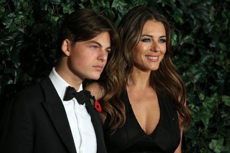 Guests at Sunday's Evening Standard Theatre Awards included British model Elizabeth Hurley (above), 51, who turned up with a handsome date - her 14-year-old son Damian with former boyfriend, American billionaire Steve Bing. The ceremony saw Harry Potter A