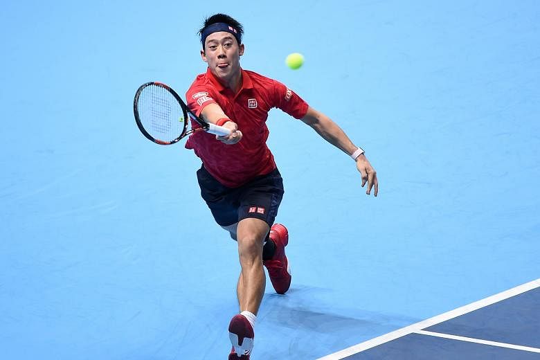 Kei Nishikori returning to Stan Wawrinka in their ATP Tour Finals group opener in London. The error-ridden Swiss was no match for the ruthlessly efficient Japanese, whose semi-final chances have risen.