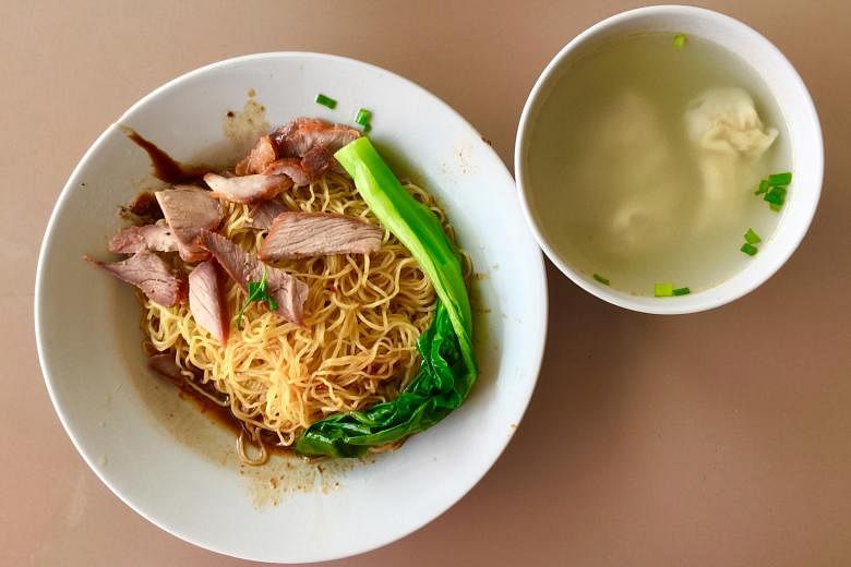 Jian Kang's dry wonton noodles come with a full stalk of vegetable and lean char siew.