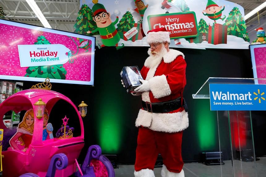 A Walmart Santa Claus at a New Jersey outlet. Walmart is boosting its online inventory for Black Friday by more than half as it pulls out all stops to grow online sales this holiday season.