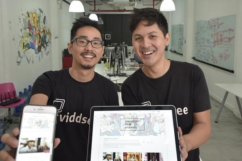 Viddsee co-founders Ho Jia Jian (left) and Derek Tan showing the Singapore Film Channel page on their local video-streaming website.