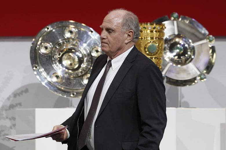 Bayern Munich president Uli Hoeness being re-elected at the Bundesliga giants' annual general meeting. He has tasked himself with seeing off the challenge of pretenders to the throne RB Leipzig.