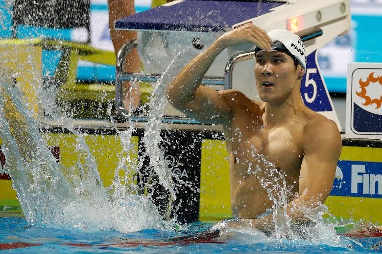 Park Tae Hwan of South Korea celebrating his victory in the 1,500m freestyle on Sunday at the 13th Fina World Swimming Championships (short-course) in Windsor, Ontario, Canada.