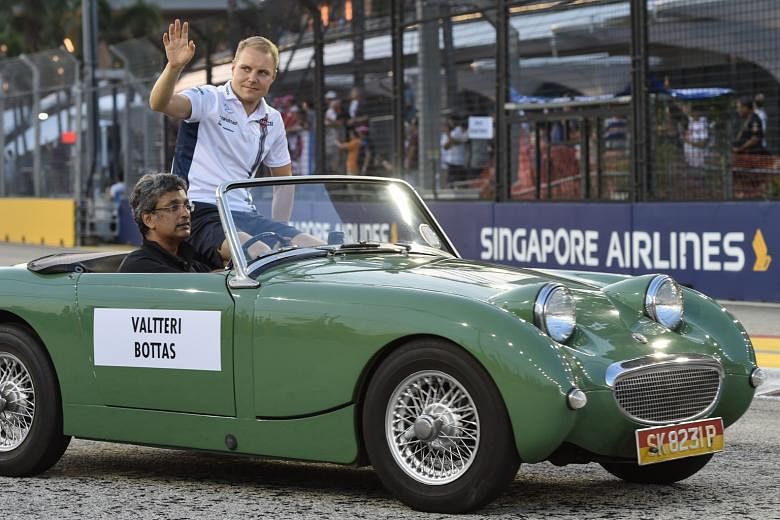 Valtteri Bottas at the drivers' vintage car parade before the Singapore race. He would be an acceptable team-mate for Hamilton.