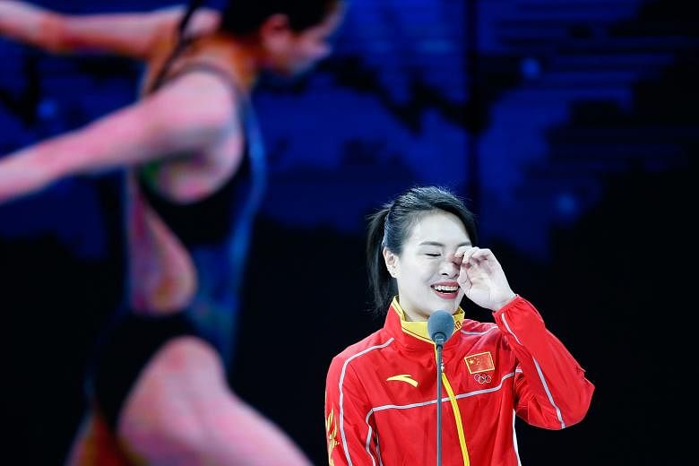 Wu Minxia, hailed by Guinness World Records as the most successful diver in Olympic history, becomes emotional during her retirement speech on Thursday, at the nomination ceremony for the year-ending CCTV Sports Personality of the Year.
