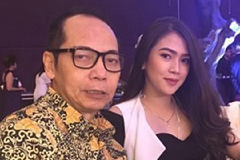A picture reproduced in The Jakarta Post showing tycoon Dodi Triyono, one of the six people found dead in a toilet in his Jakarta home on Tuesday, and his widow Agnesya Kalangi, who is reportedly seven months pregnant with their first child.