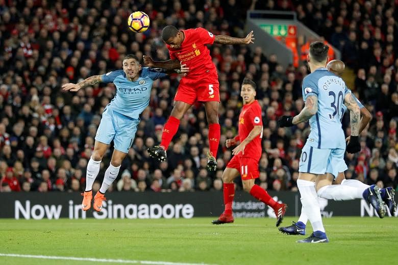 Georginio Wijnaldum's thumping header in the eighth minute turned out to be Liverpool's winning goal against Manchester City. The three points kept the Reds on Premier League leaders Chelsea's tails, six points behind.