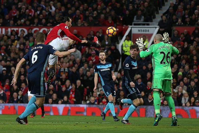 Zlatan Ibrahimovic scoring with a high kick for Manchester United against Middlesbrough in a Premier League match on Saturday, but it was ruled out by referee Lee Mason as the striker collided with goalkeeper Victor Valdes. United eventually won the 