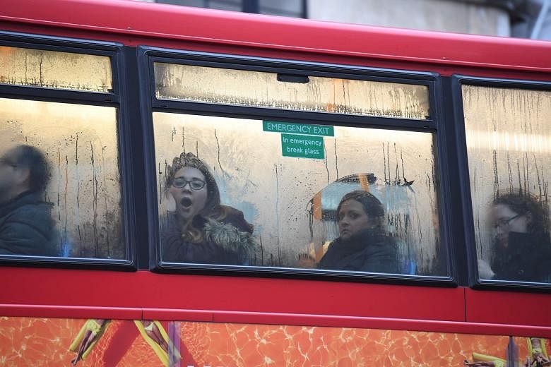 Many were forced to take buses after a rail strike in London yesterday.