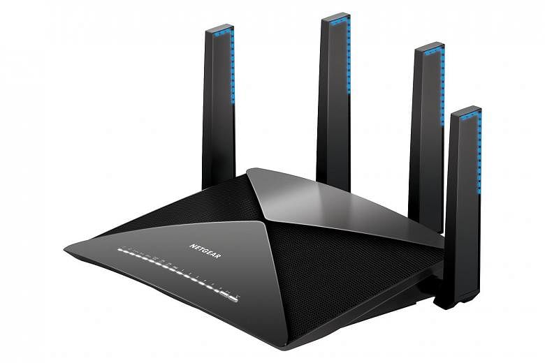 The Netgear Nighthawk X10 (far left) packs everything but the kitchen sink. The TP-Link Talon AD7200 (left) tells you if your new password is weak and can be easily deduced.