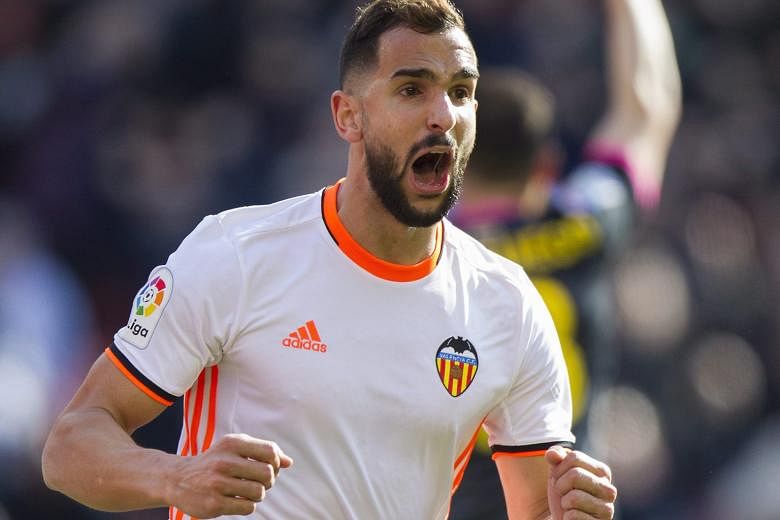 Defender Martin Montoya celebrating his 17th-minute opener against Espanyol. The hosts overcame pre-match protests against club owner Peter Lim and president Chan Lay Hoon to win 2-1, their first first Spanish Primera Liga win since October.