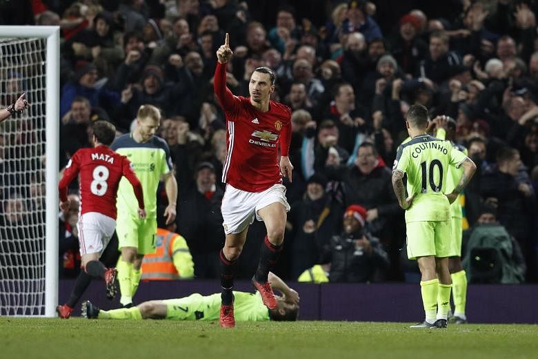 Manchester United striker Zlatan Ibrahimovic celebrates after scoring an equaliser against Liverpool. His joint league-leading 14th goal this season demonstrated all his athleticism, power and poise, as the Swede twisted in the air to get some unlike