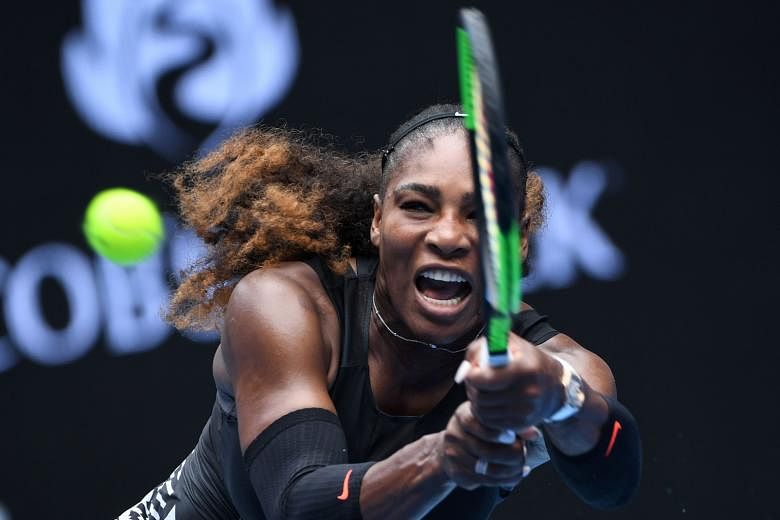 Serena Williams returns against Barbora Strycov. The world No. 2 fended off a tough challenge to win 7-5, 6-4 and will face Johanna Konta in the quarter-finals.