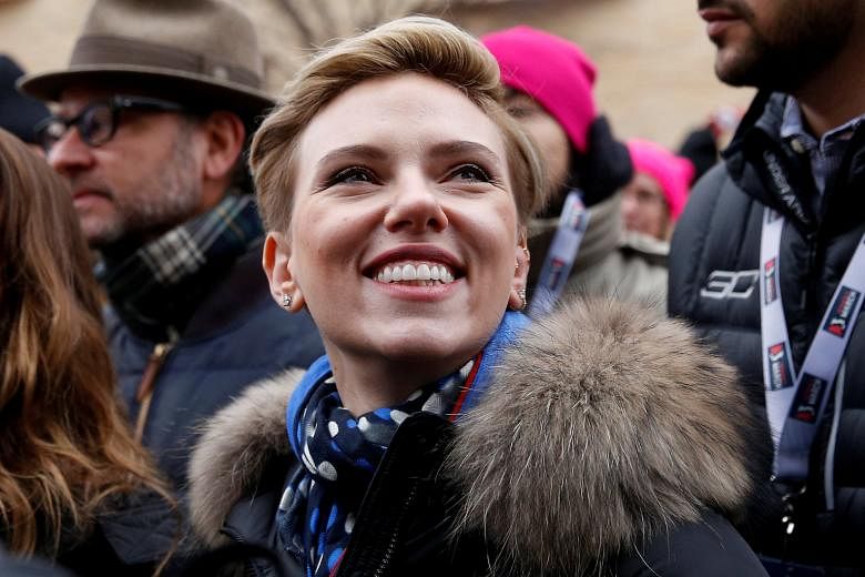 Scarlett Johansson was seen without her wedding ring at the Women's March in Washington, DC last weekend. Carnegie Hall will be hosting concerts of Philip Glass' music, some of which are obscure works. Elton John returns to Broadway by writing music 