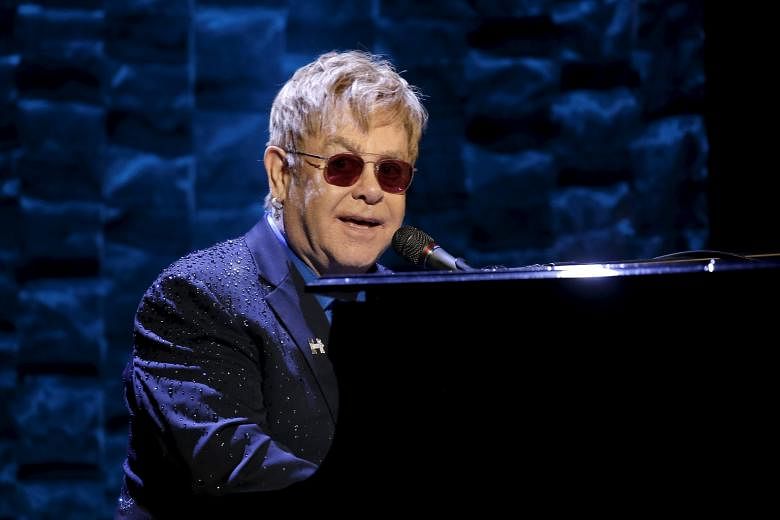 Scarlett Johansson was seen without her wedding ring at the Women's March in Washington, DC last weekend. Carnegie Hall will be hosting concerts of Philip Glass' music, some of which are obscure works. Elton John returns to Broadway by writing music 