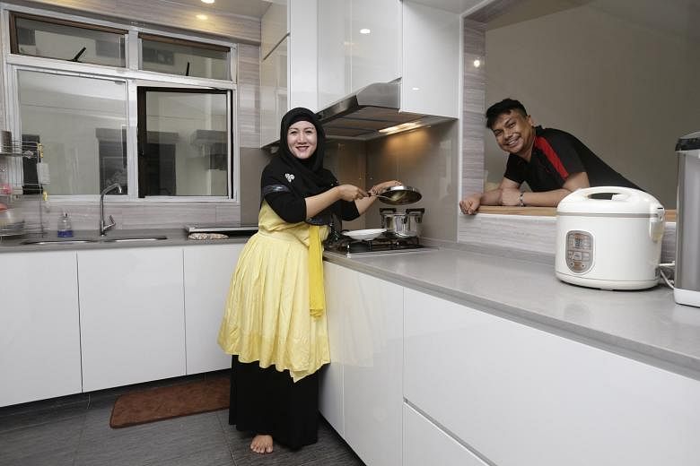 Mr Abdul Halil and his wife, Ms Stevanie Nur Rindyanie, in their renovated and fully furnished home. They had to live in a partially renovated flat (below) last year, after their interior designer left them in the lurch.