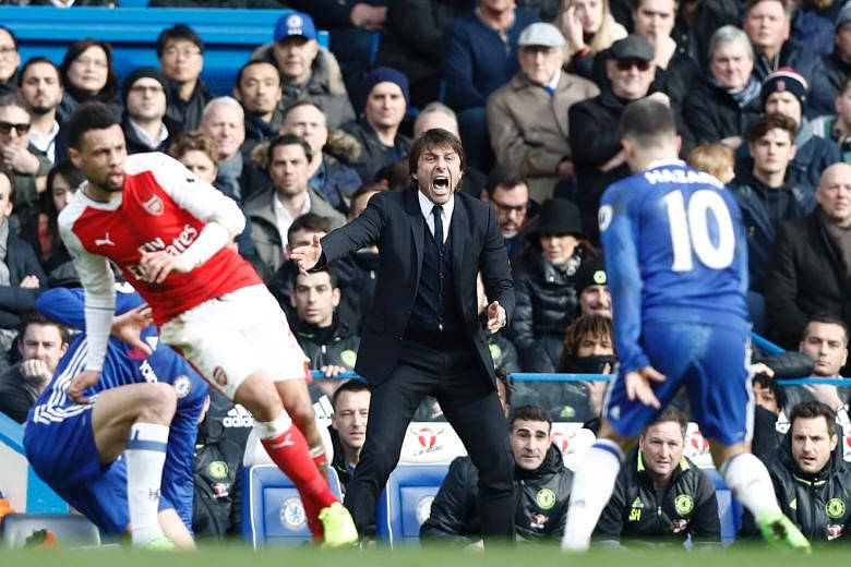 Chelsea manager Antonio Conte shouting to his players during the 3-1 win over Arsenal on Saturday. He has turned an underperforming team into near unbeatables in just over four months.