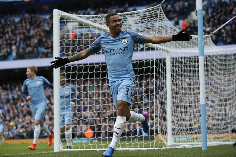 Manchester City's Gabriel Jesus celebrating his first goal. The Brazilian also scored in injury time against Swansea, his third goal in two starts, to give his side all three points.