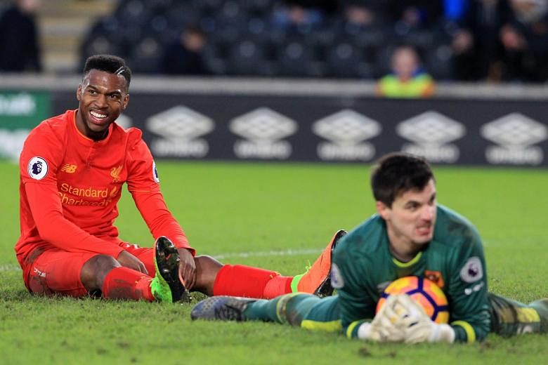 Liverpool striker Daniel Sturridge spurning a goal-scoring chance against Hull, who upset the odds to beat Liverpool 2-0 at home. The Reds remain winless in the Premier League so far this calendar year, 13 points behind runaway leaders Chelsea.