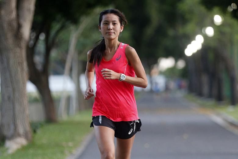 Marathon runners Jasmine Goh (above) and Rachel See have both met the SEA Games qualifying benchmark after their performances in the Hong Kong Marathon yesterday.