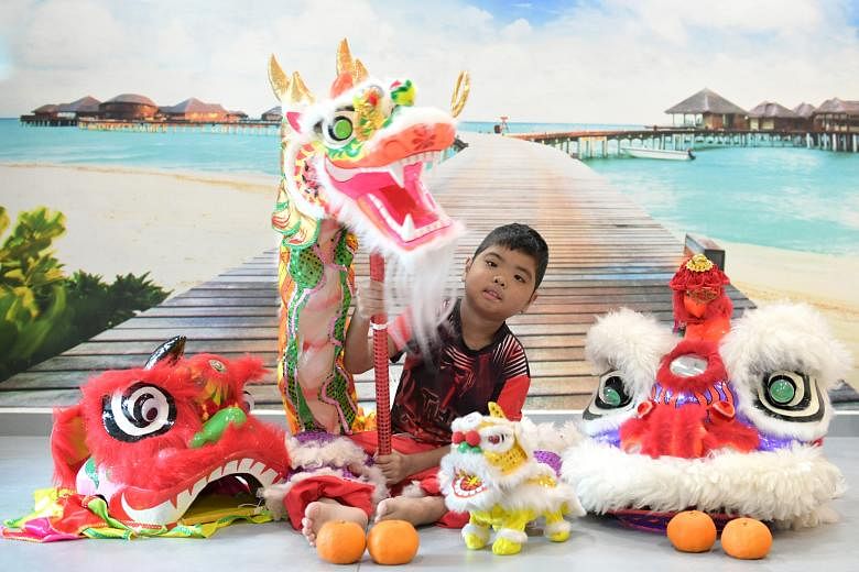 With two transplants behind him, Boon Kye Feng, now 10, can enjoy doing the lion dance.