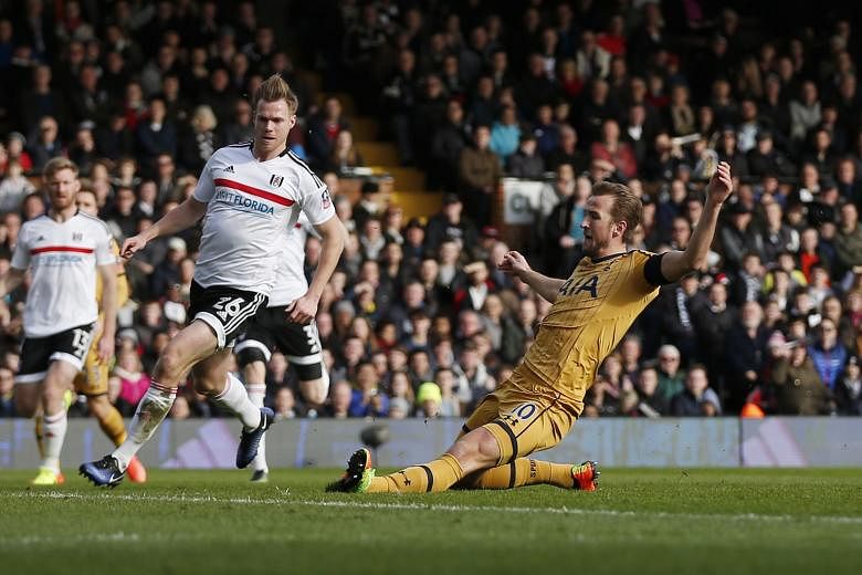 Tottenham's Harry Kane sliding in to open the scoring against Fulham in the 16th minute, after Christian Eriksen had placed the ball on a platter for the England striker. The Spurs duo repeated the combination in the 51st minute as Kane buried anothe