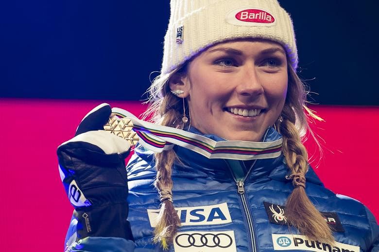 Mikaela Shiffrin of the United States celebrates her victory at the world titles in St Moritz, Switzerland on Saturday.