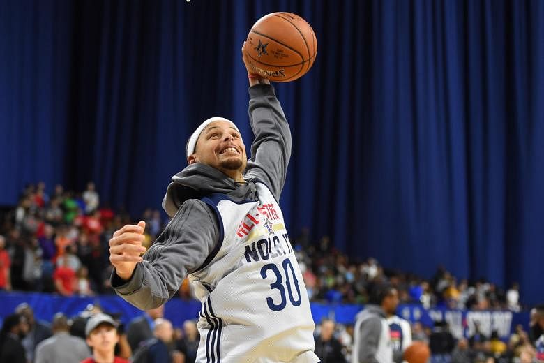 Stephen Curry during an All-Star practice session on Saturday. LeBron James of the Cleveland Cavaliers said he does not view Curry as a rival.