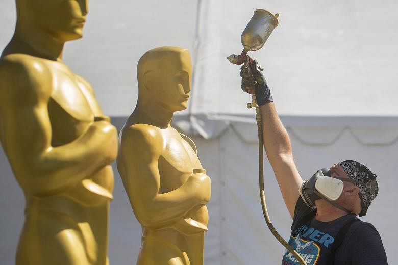 Stage craft artist Rick Roberts giving Oscar statues a fresh coat of paint in preparation for the 89th Academy Awards in Los Angeles today (tomorrow, Singapore time).