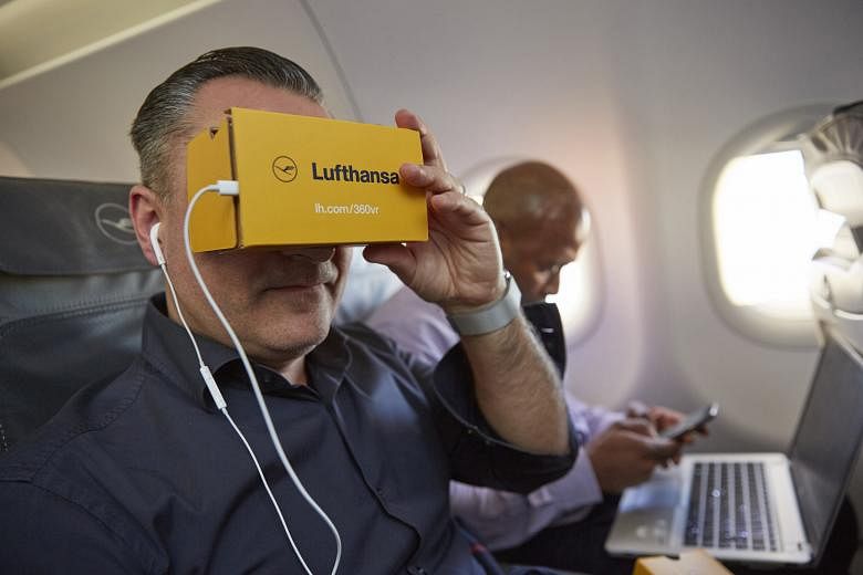 A guest trying out a Lufthansa 3D virtual reality information and entertainment app.