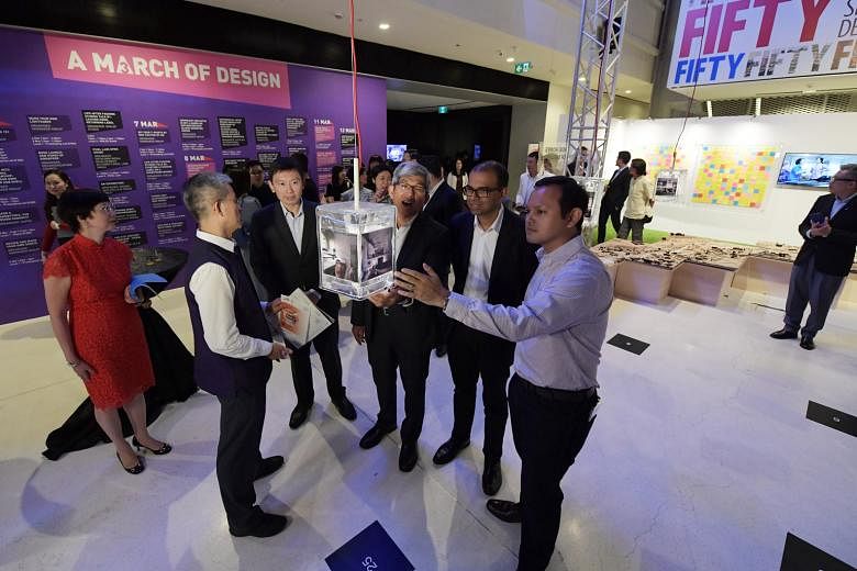 With Dr Yaacob (third from right) at the opening of this year's Singapore Design Week at the National Design Centre are (from left) Associate Professor Wong Yunn Chii, NUS department of architecture; Mr Chee Hong Tat, Minister of State, Ministry of C