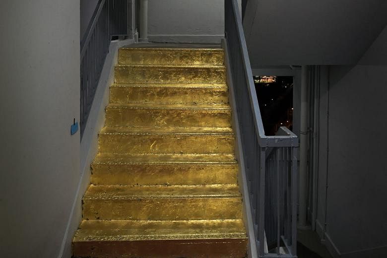 The "golden staircase" on the 20th floor of Block 103, Jalan Rajah. Ms Dia's work earned her praise from netizens, but the Jalan Besar Town Council pointed out that it was not permissible under the council's by-laws.