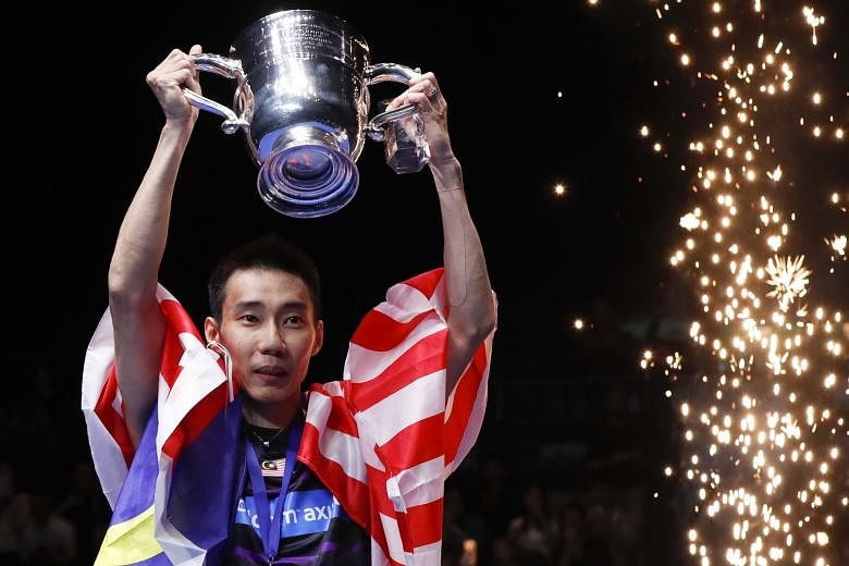 Malaysian badminton great Lee Chong Wei lifting the All England trophy. The world No. 1's love affair with the sport's oldest tournament continued yesterday, as he won the title for the second time in four years. The 34-year-old was also the champion