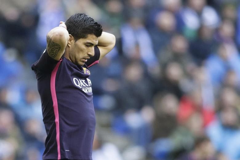 A frustrated Luis Suarez, who scored Barcelona's equaliser at Deportivo. Poor defending from corners cost them in the 1-2 loss, as they conceded top spot in La Liga to Real and Barca manager Luis Enrique knows they need a "very strong" finish to secu