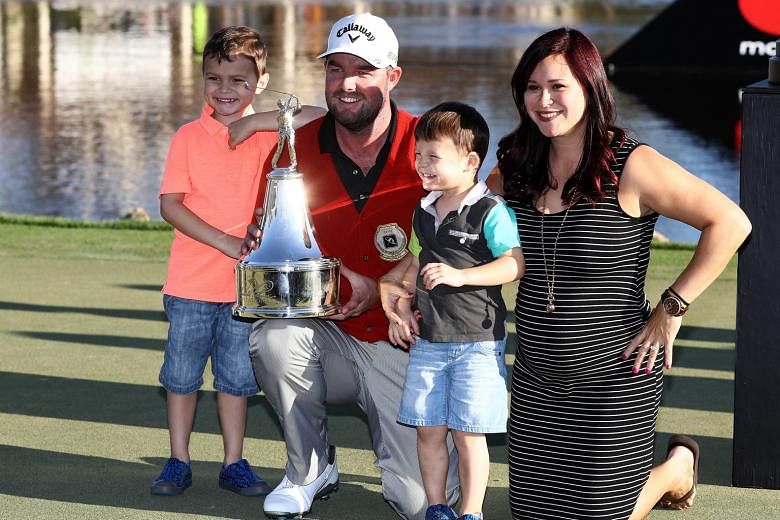 A dream come true for the family as Australian Marc Leishman celebrates with expectant wife Audrey and sons Harvey and Oliver after winning the Arnold Palmer Invitational in Orlando, Florida.