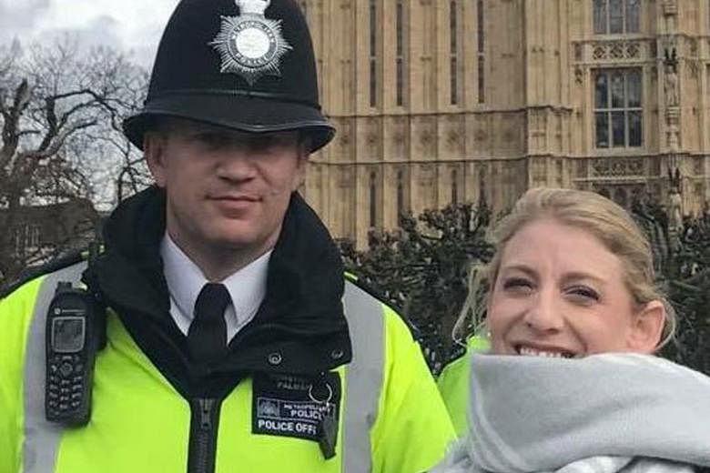 The photo of US tourist Staci Martin with police officer Keith Palmer. It was taken shortly before he was stabbed to death.