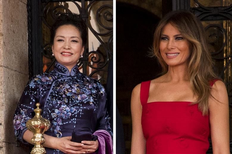 Ms Peng Liyuan and Mrs Melania Trump arriving at Palm Beach International Airport in Florida on Thursday. The First Ladies both later wore dresses that matched their husbands' tie colour at the Mar-a-Lago resort in Palm Beach, Florida.