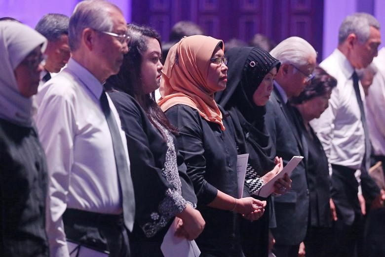 (From left) Speaker of Parliament Halimah Yacob; former Cabinet minister Ong Pang Boon; Mr Othman Wok's daughters Diana and Lily; his widow Lina Abdullah; President Tony Tan Keng Yam and his wife Mary; and Prime Minister Lee Hsien Loong at the memori