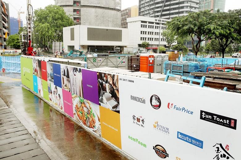 Above: A view of the construction site from the street. The underpass is part of a land sale requirement set by JTC Corporation when Mapletree won the tender to de