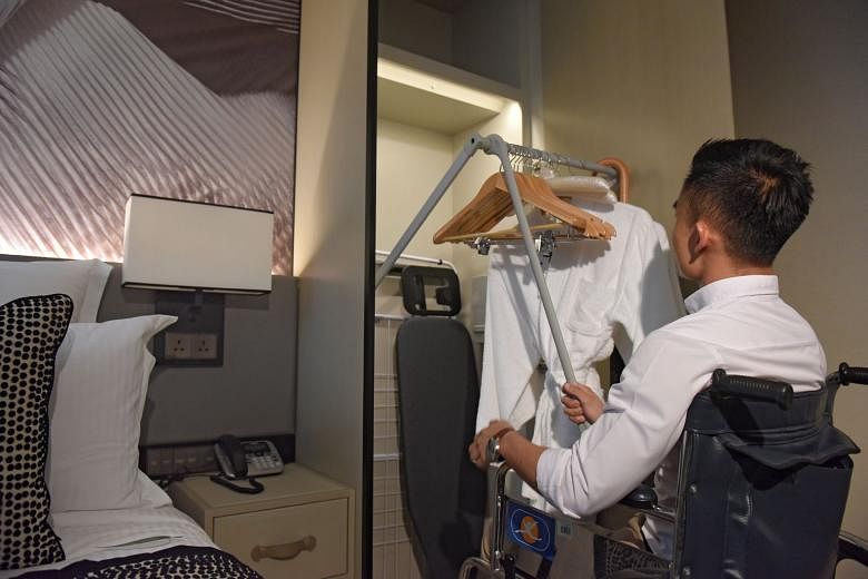 A user-friendly wardrobe for wheelchair users at the Ascott Orchard (above) serviced residence, which is part of CapitaLand's integrated development in Cairnhill. 