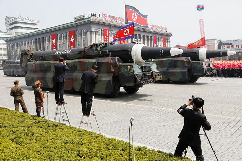 Missiles on show during a military parade in North Korea. The regime's race to build a warhead that could reach the US has recently brought the modern arms race into focus.