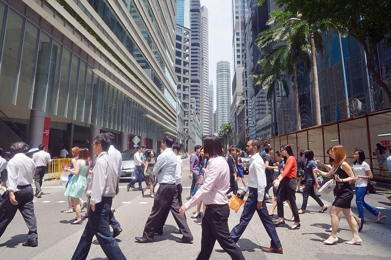 The office crowd in the Central Business District. Singapore is losing its economic competitiveness and a slowdown in productivity is at the core of its stagnating economic growth, says the writer.