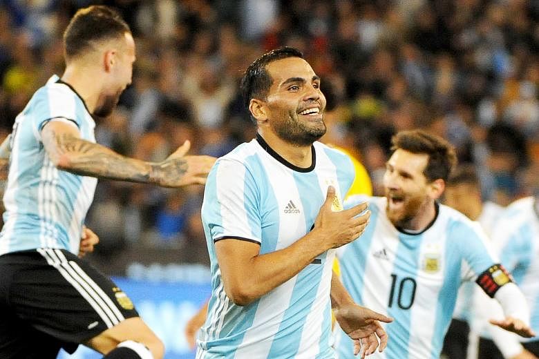 Top: Sevilla defender Gabriel Mercado (centre) celebrating with his Argentina team-mates after scoring the only goal of the match on the stroke of half-time against Brazil in front of 95,569 fans at the Melbourne Cricket Ground. Right: Manchester Cit