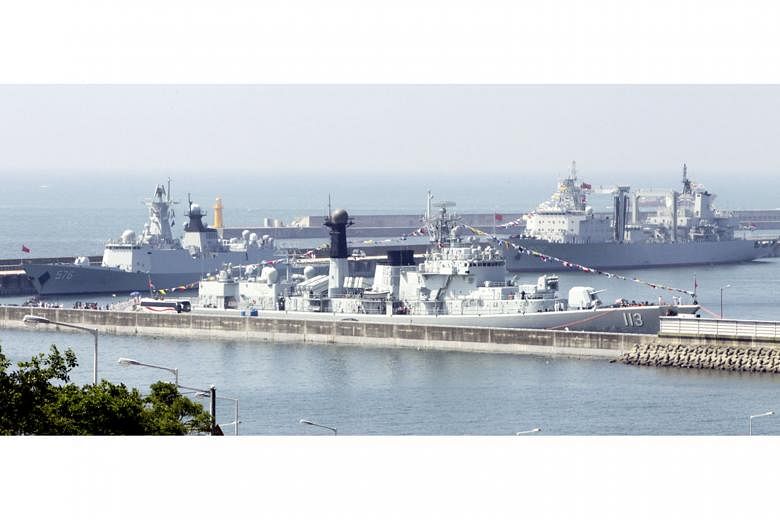 Naval vessels from China's North Sea Fleet at Busan port in South Korea last year after taking part in an anti-piracy mission. China's industrial advances and growing military might have dominated many a discourse on its political ambitions globally 