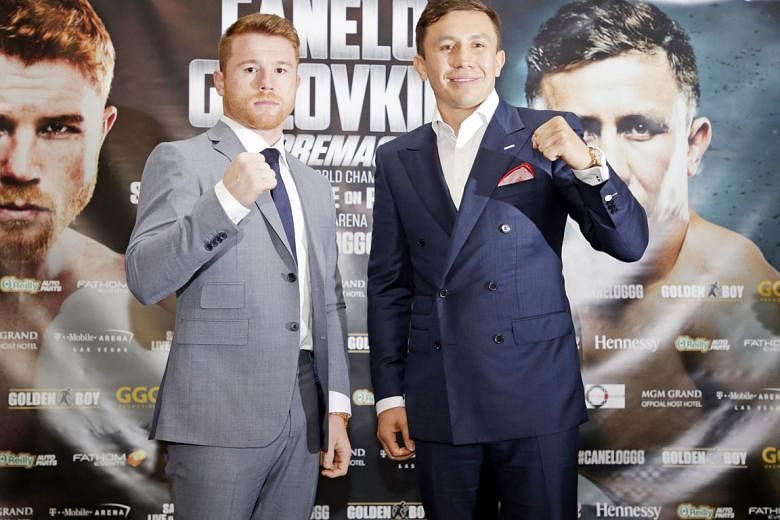 Gennady Golovkin of Kazakhstan and Mexico's Saul Alvarez (far left) posing for the media at a press conference ahead of their Sept 16 middleweight boxing clash at the T-Mobile Arena in Las Vegas, United States.