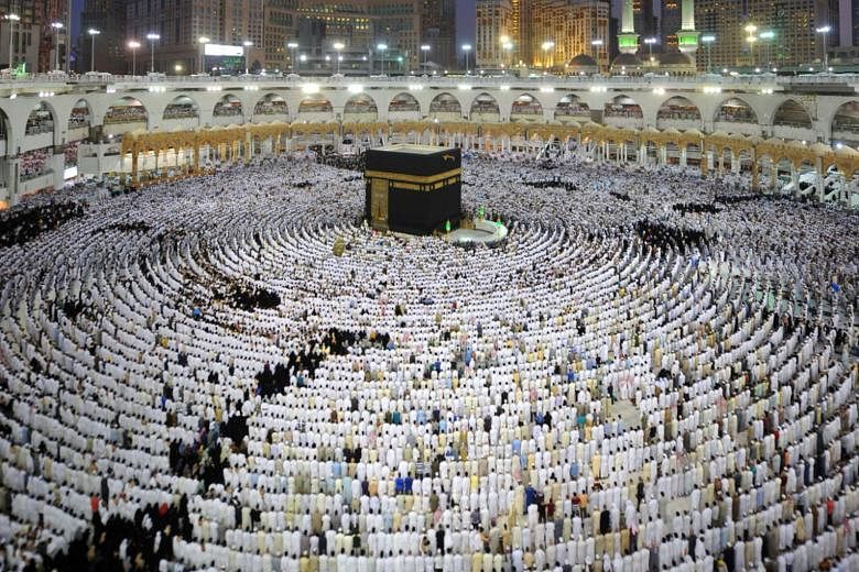 Muslim worshippers praying at the Kaaba at Mecca's Grand Mosque last Friday. Saudi Arabia's Interior Ministry said a terrorist attack had been planned against the mosque.