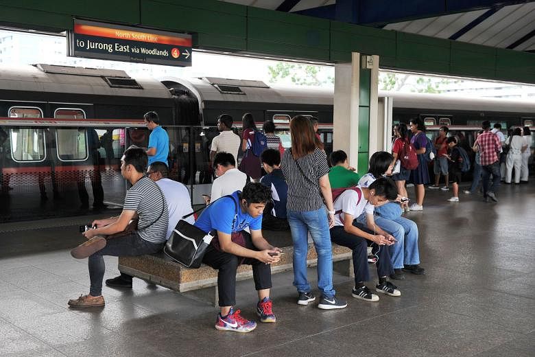 Passengers waiting at a station on the North-South Line. With demand for trains only set to increase in the future, it is important to plan ahead and increase the rail capacity in time. This can help avoid breakdowns such as what happened in 2011, wh