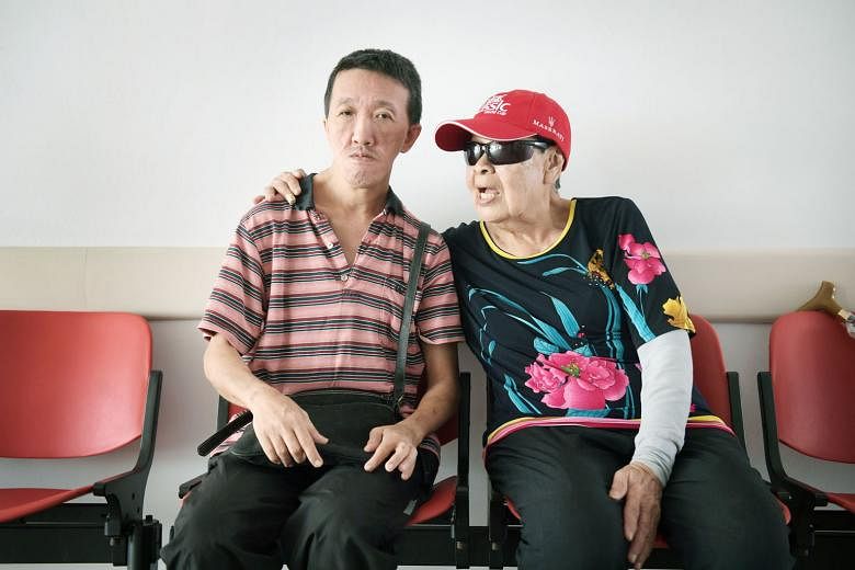 Madam Ng Ah Chun, 89, single-handedly raised Mr Tan Chye Teck, 50, after he was abandoned by his parents as a baby. He was diagnosed with moderate intellectual disability as a child but that did not deter her from looking after him, even though it wa